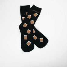  Schwarze Socken mit Erdnussgläsern